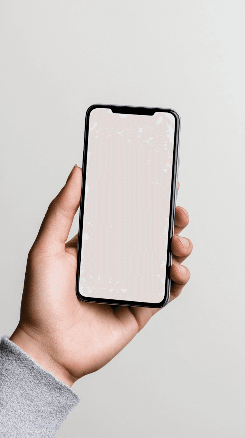 A hand holding a smartphone